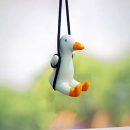 image-Swing Duck Car Pendant Aroma Diffuser