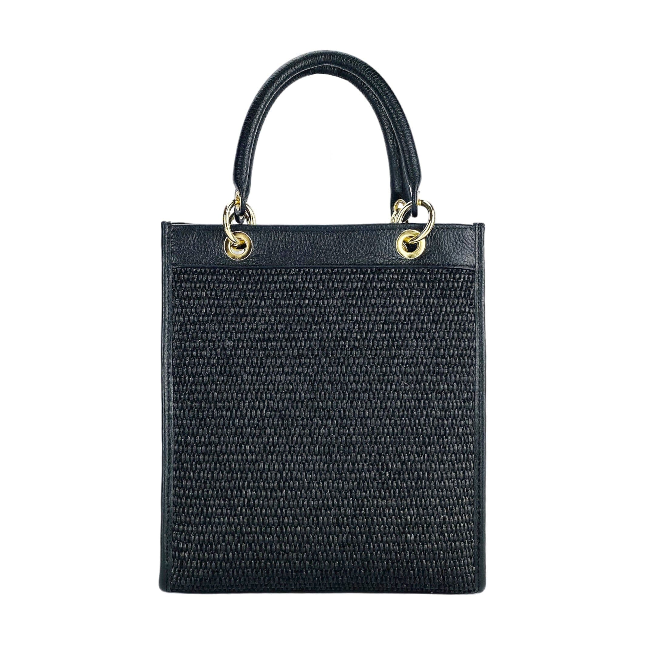 image-RB1026A | Vertical women's handbag in genuine leather and straw Made in Italy. Removable and adjustable leather shoulder strap. Polished Gold Accessories - Black Color - Dimensions: 24 x 29 x 9 cm
