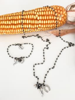image-Rosary Necklace and bracelet silver and black ematite with charms.