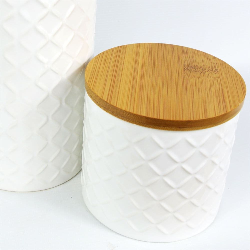 image-Set of Two Ceramic Jars Embossed Cream Canisters with Lids