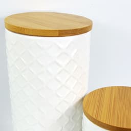 image-Set of Two Ceramic Jars Embossed Cream Canisters with Lids