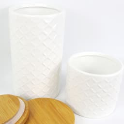 image-Set of Two Ceramic Jars Embossed Cream Canisters with Lids