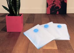 image-4pc Medium Travel Reusable Vacuum Storage Bags 50 x 70cm
