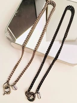 image-Silver and Gunmetal Curb Chain Necklace and Rudder Clasp.