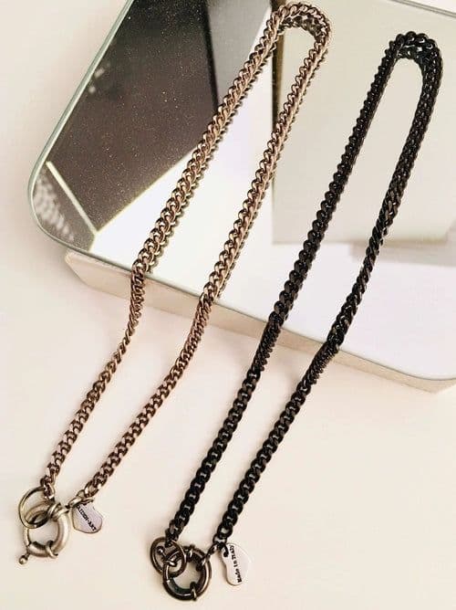 image-Silver and Gunmetal Curb Chain Necklace and Rudder Clasp.