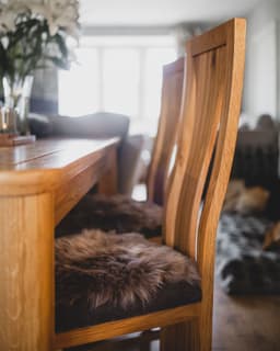 image-Icelandic Sheepskin Seat / Chair Pad - Natural Shape 42 x 35cm