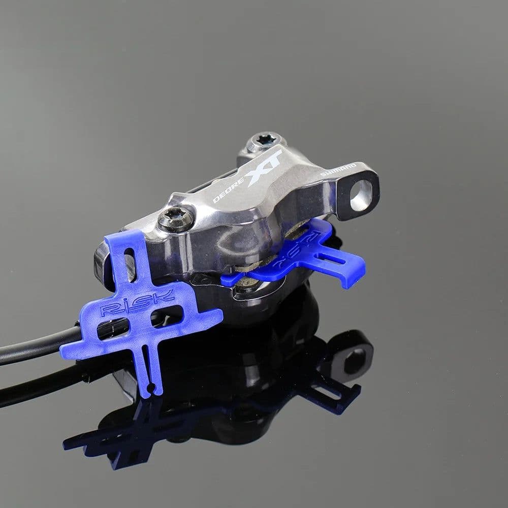 image-RISK MTB Bike Hydraulic Disc Brake Pads Spacer Instert Bicycle Brake Caliper Pad Washer Mountain Disc Brake Piston Retainer Tool